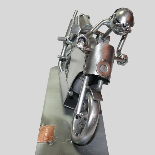 Schraubenmännchen Motorrad in Kurve