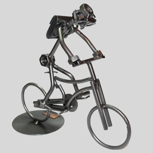 Schraubenmännchen Schüler auf Fahrrad Bild 2